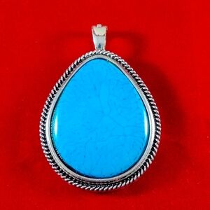 VINTAGE R.M.N. BRAND BIG STATEMENT PENDANT.